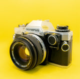 Olympus OM10 + Zuiko 50mm 1.8 - 35mm SLR Vintage Film Camera - Not Manual Adapter incluided *